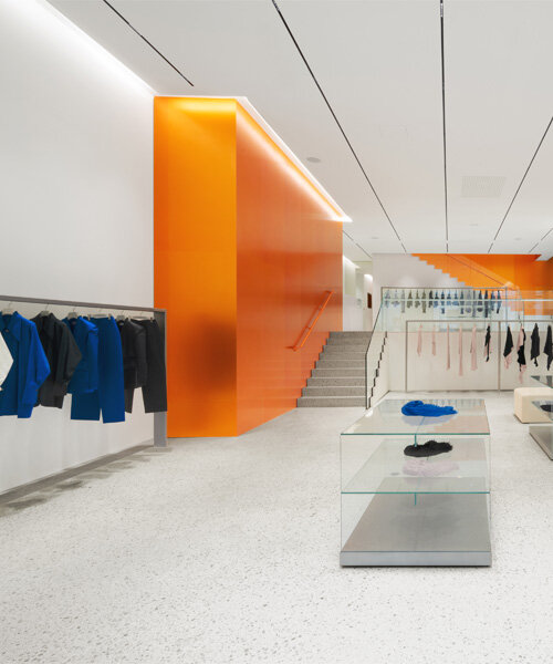 orange aluminum walls light up issey miyake's latest flagship store in paris