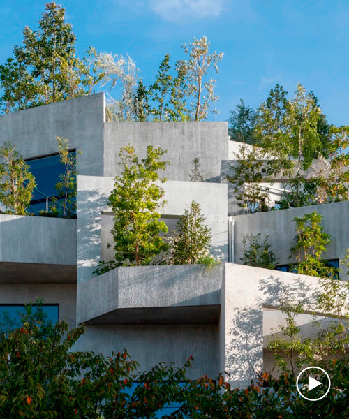 free-flowing verdant tiered terraces envelop NOT A HOTEL's facade in fukuoka