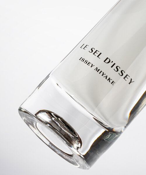 tokujin yoshioka’s issey miyake perfume emits light into the bottle from the oval glass bottom